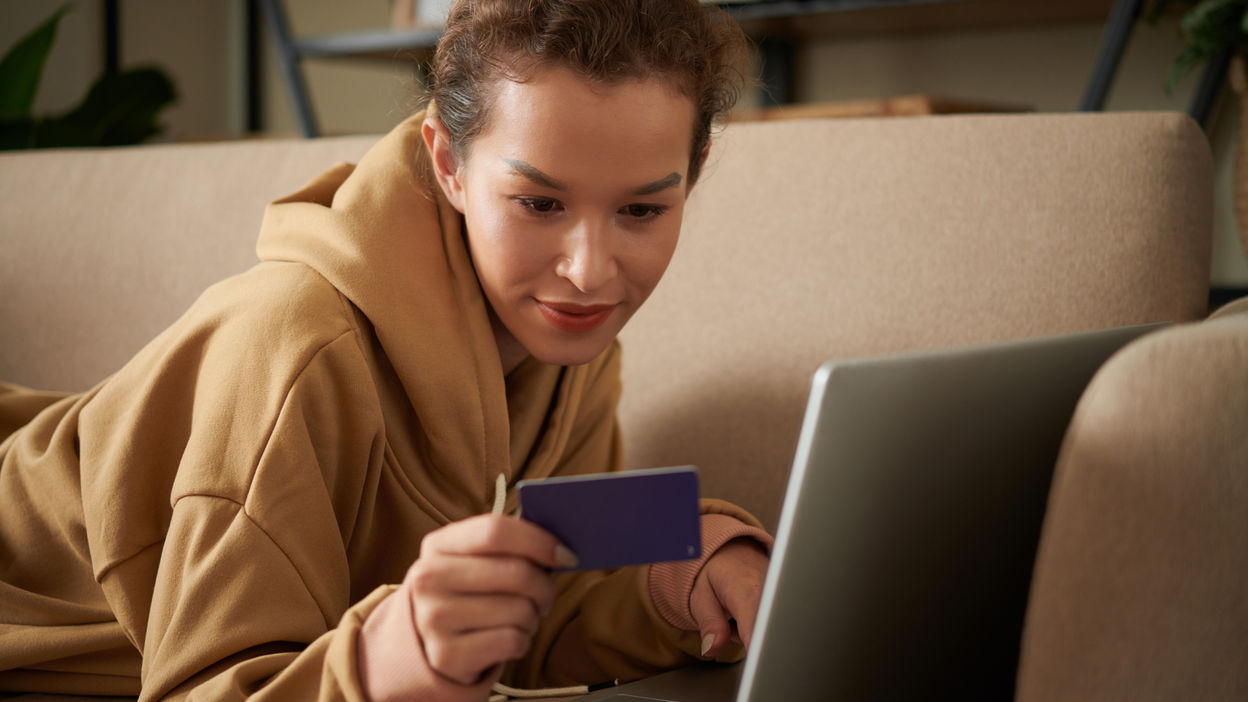 woman-paying-online-with-credit-card-2022-02-28-21-47-50-utc