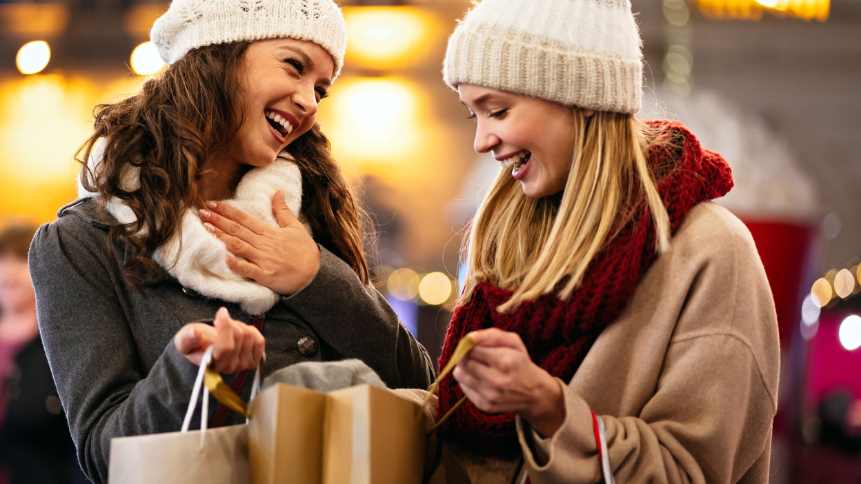 happy-women-friends-are-shopping-for-presents-at-c-2022-01-18-23-55-18-utc