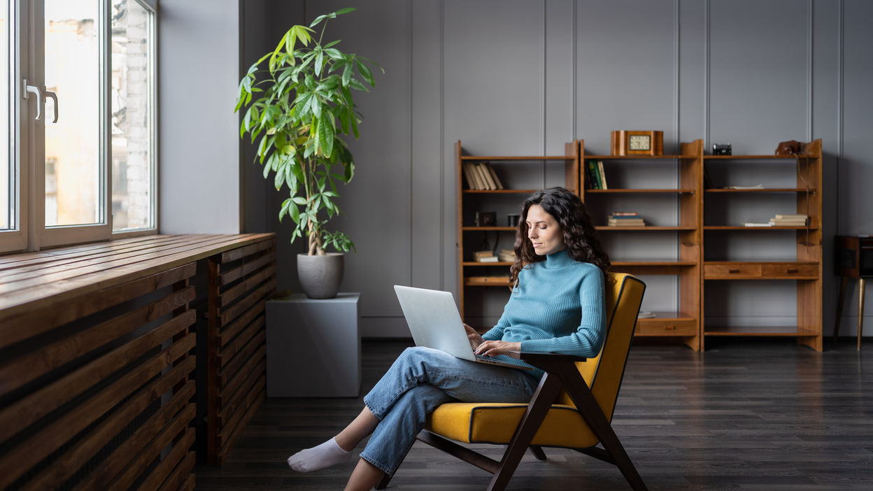 young-woman-freelancer-work-on-laptop-at-home-typi-2023-11-27-05-03-41-utc