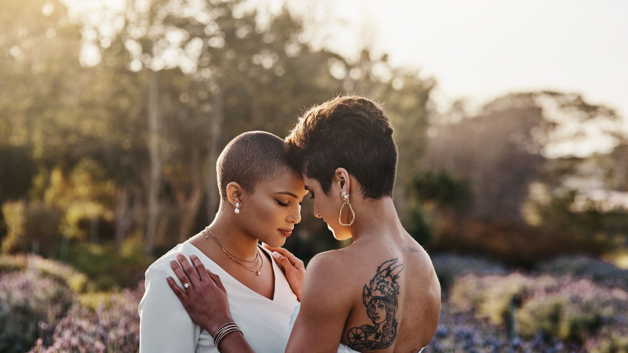 cropped-shot-of-a-young-couple-standing-together-o-2022-12-22-19-55-48-utc