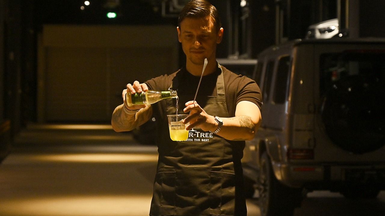Bartender pouring a Fever-Tree mocktail