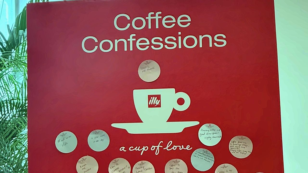 The Coffee Confessions wall covered in handwritten guest notes