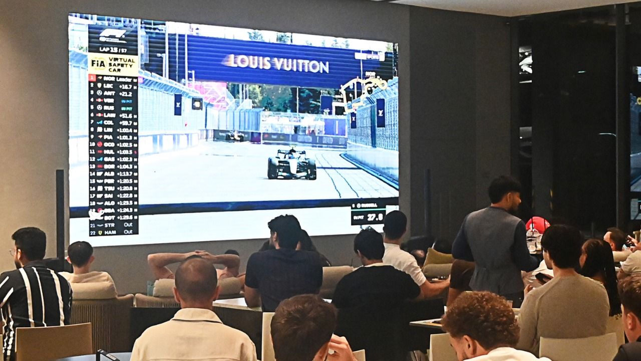 Guests watching the race live at AMG Kaffeehaus in Dubai Design District