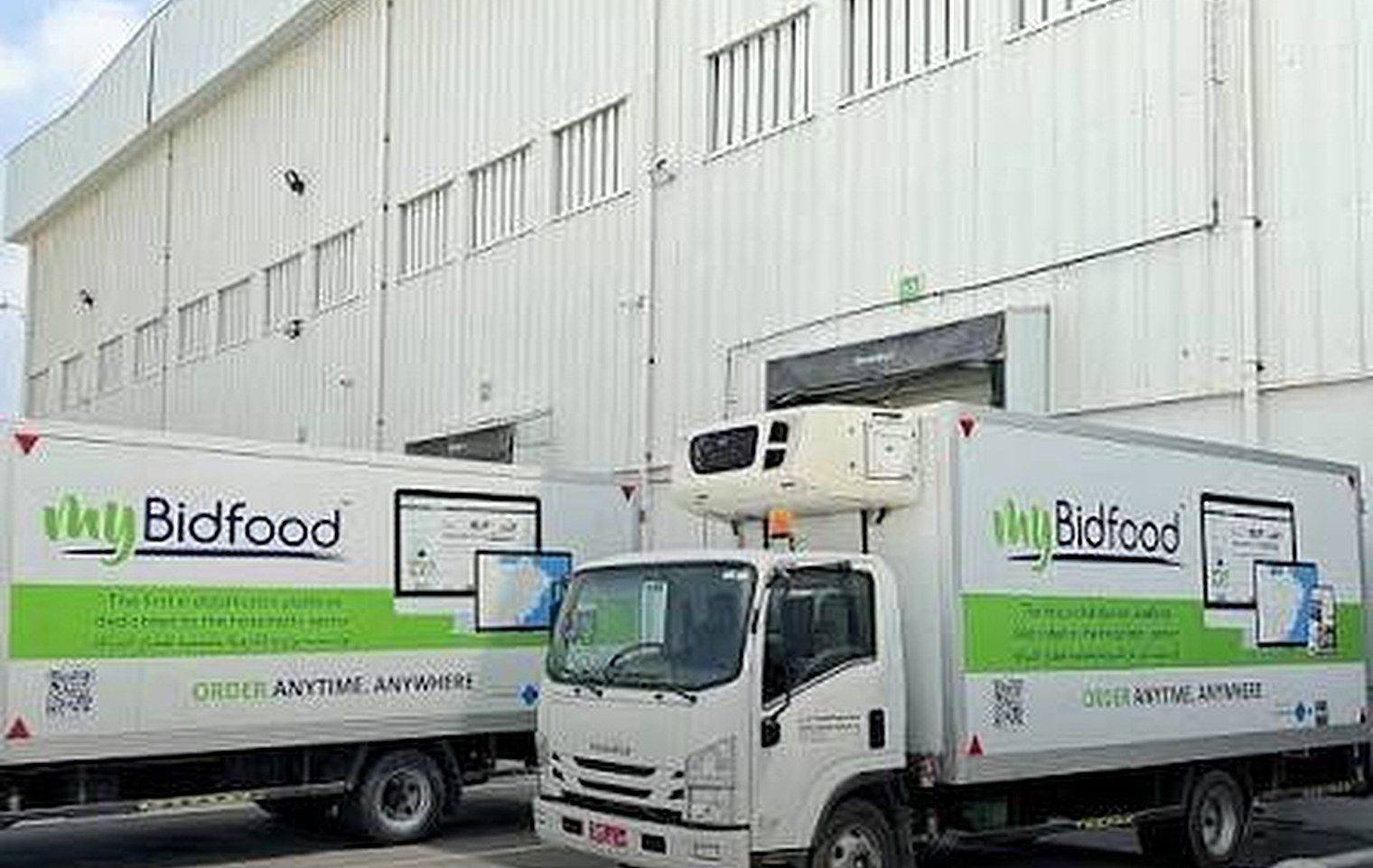 Bidfood Oman temperature-controlled delivery trucks with myBidfood branding