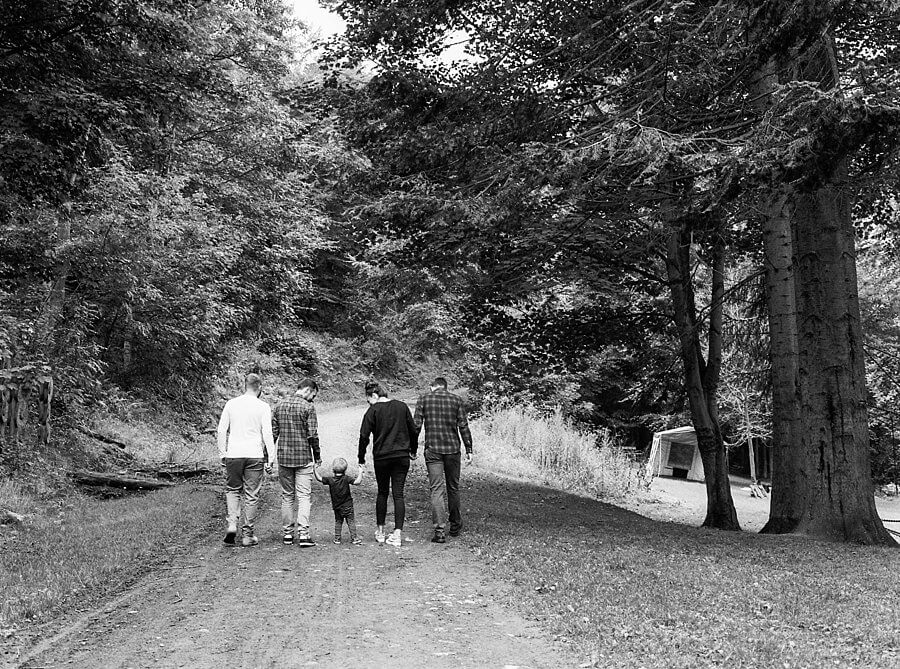 Black and White images of family walking away through the woods | Family Woodland Shoot