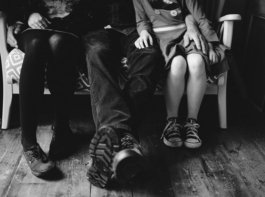 Black and white shot of legs and shoes | Colour family photography