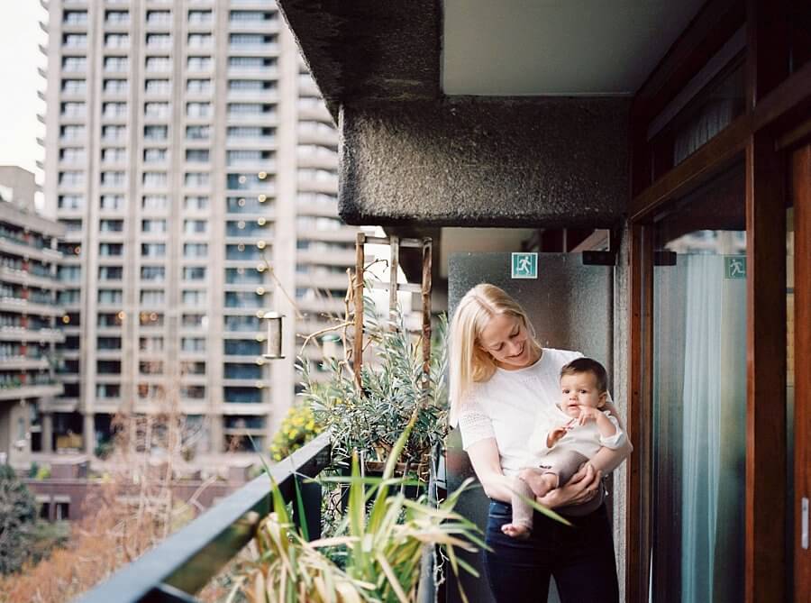 Mum holiday baby on balcony