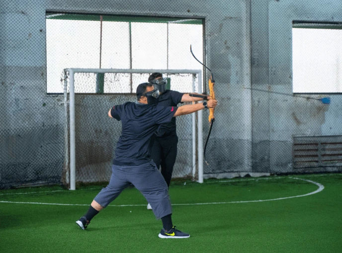 Indoor combat archery team building Singapore