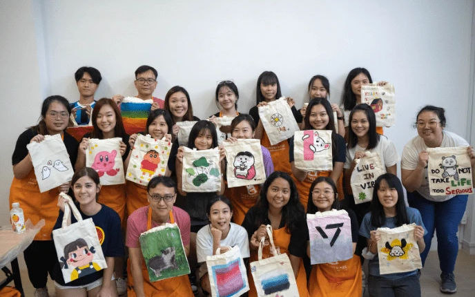 Painted tote bags from a tote bag art jamming workshop