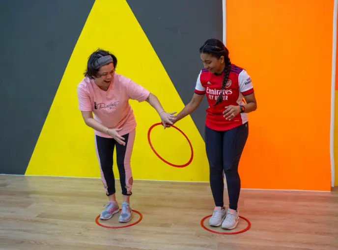 clients in a funsical 100 team building session