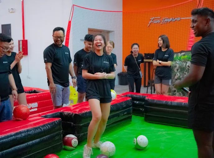 clients in a poolball team building session in singapore