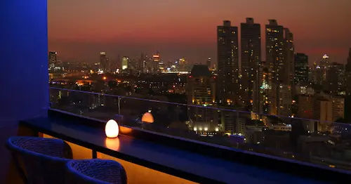 Drink Cocktails at a Rooftop Bar