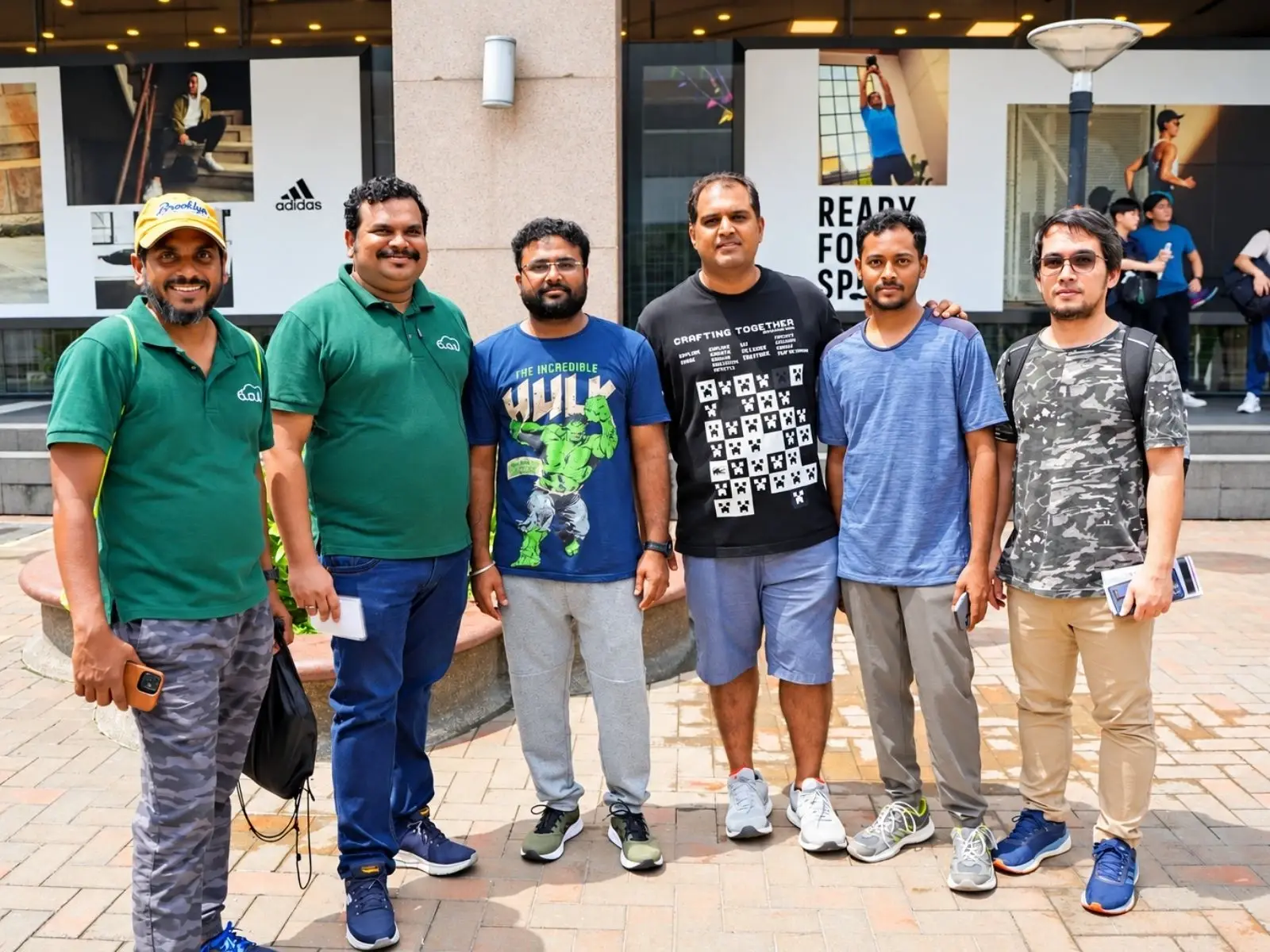 A team of six pose together before their race