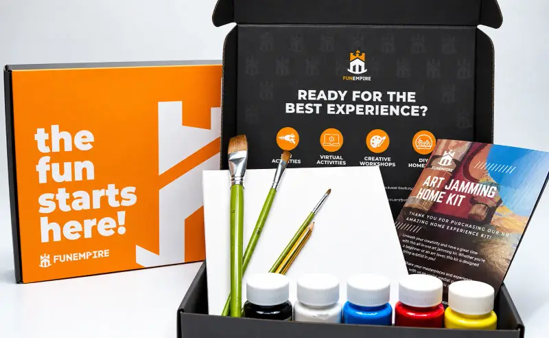 The Art Jamming Home Kit: brushes, a canvas and five pots of acrylic paint in its box