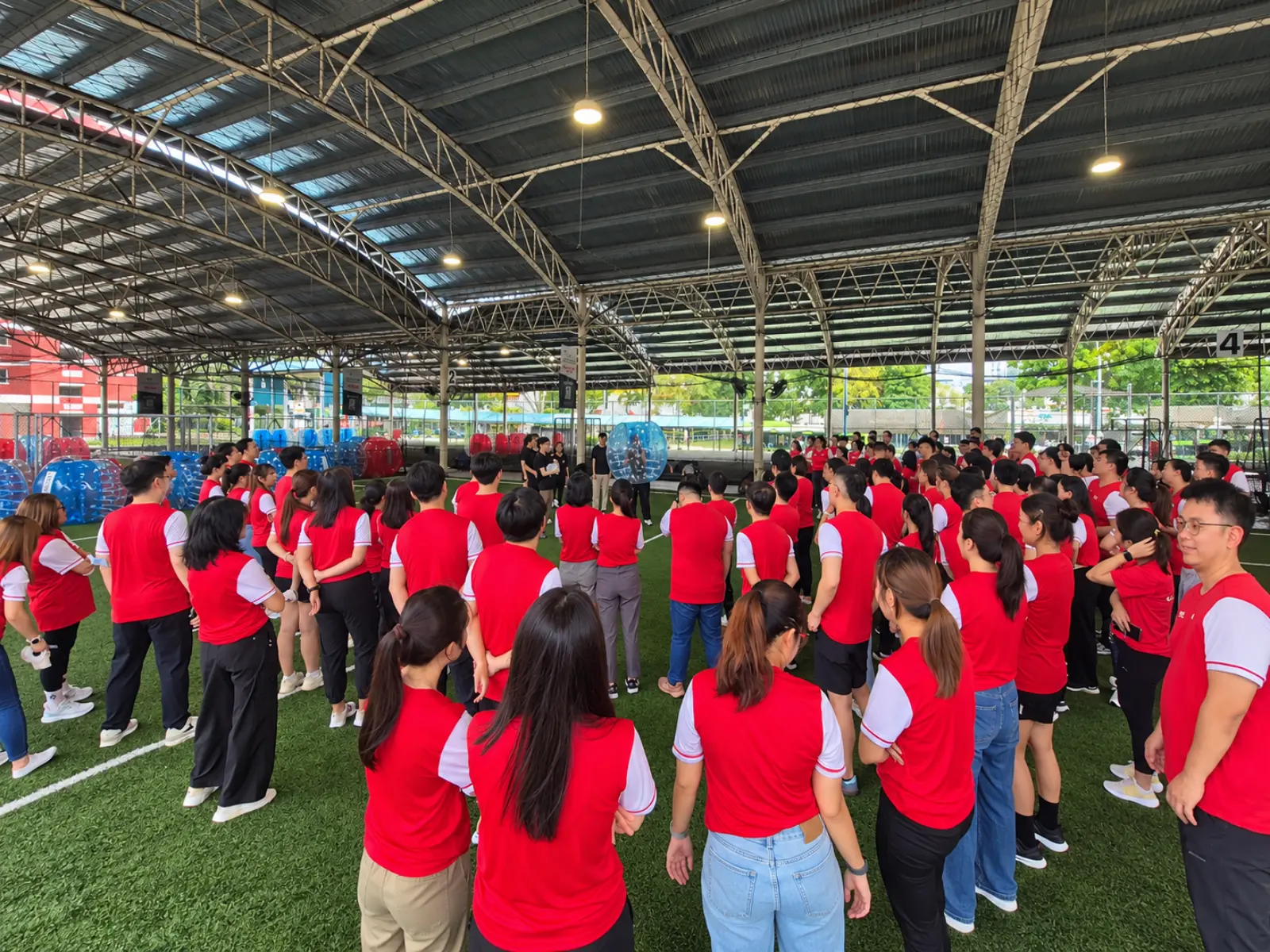 Staff lined up before a large-scale company event