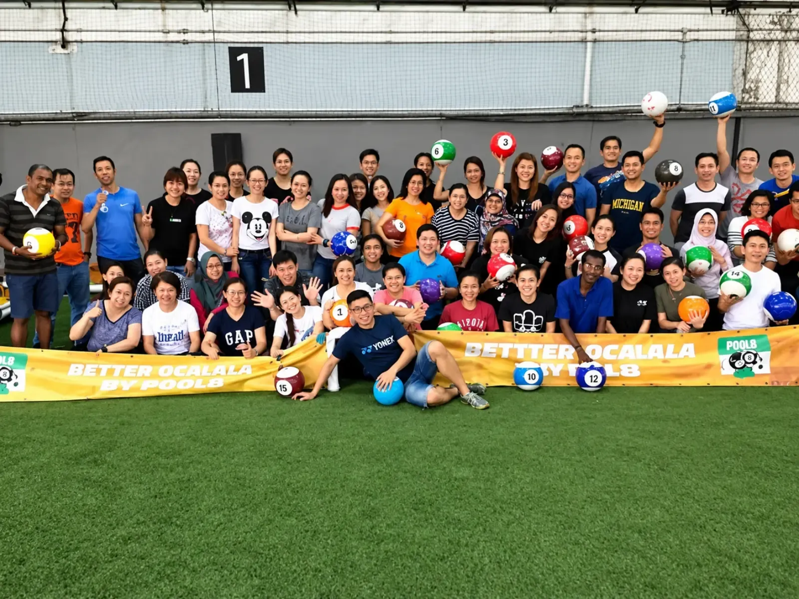 Watsons Singapore staff gather for a group photo at The Cage @ Kallang