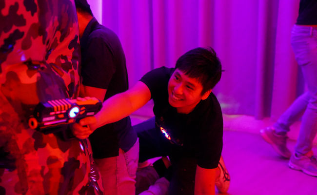 clients in a game of laser tag in singapore