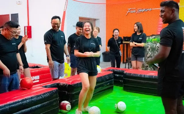 indoor poolball as a team building activity in singapore