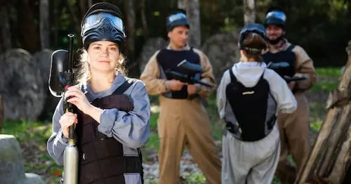 team preparing for a paintball session