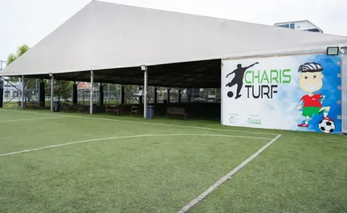 Sheltered turf under a tent roof at CharisTurf Eunos