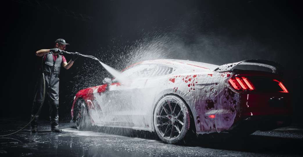 cleaning car with Pressure Washer
