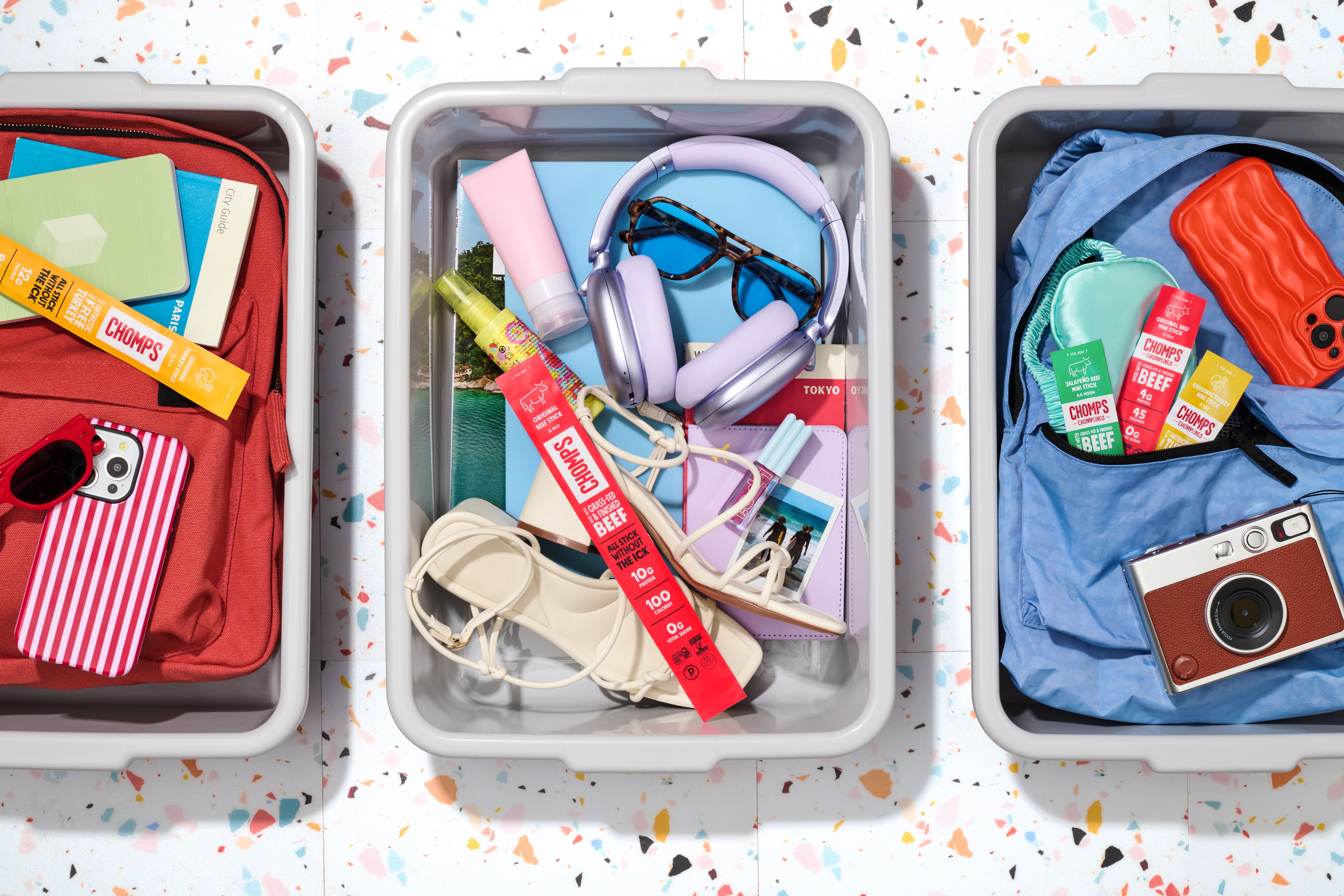 Chomps packed in travel organizers with travel essentials