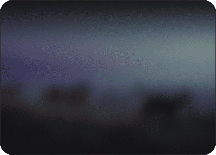Blurred dark blue landscape at dusk.