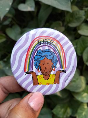 Queer with a Rainbow badge 