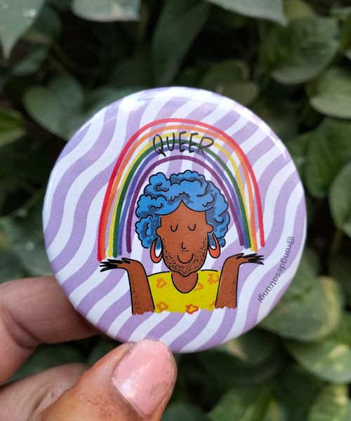 Queer with a Rainbow badge 