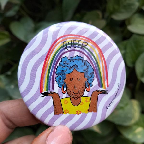Queer with a Rainbow badge 
