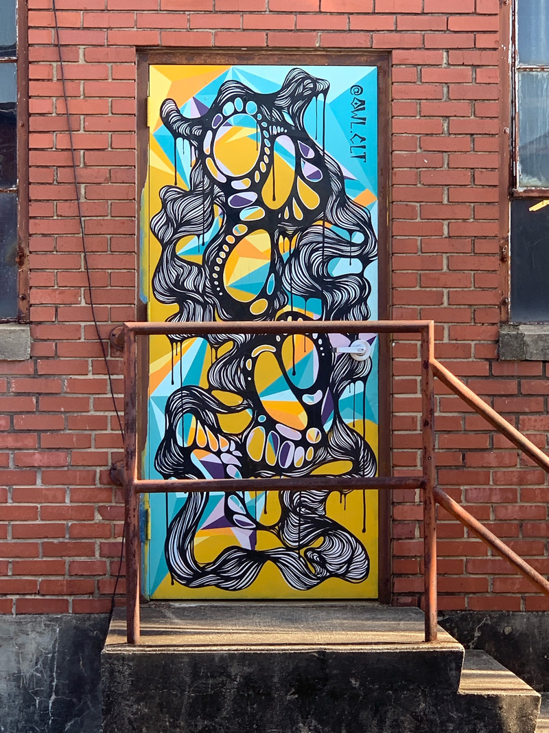 mural in Charlotte by artist Owl.