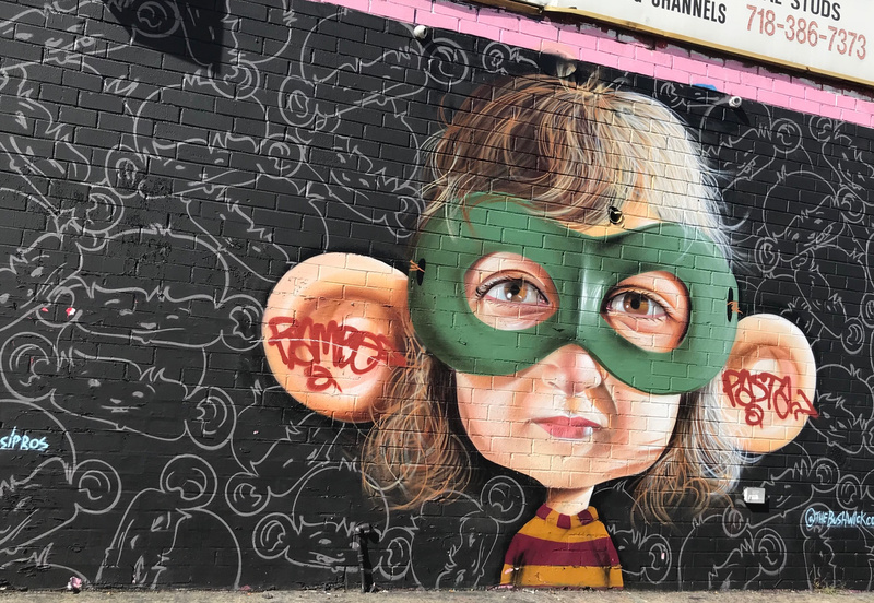 mural in Brooklyn by artist Sipros Naberezny.