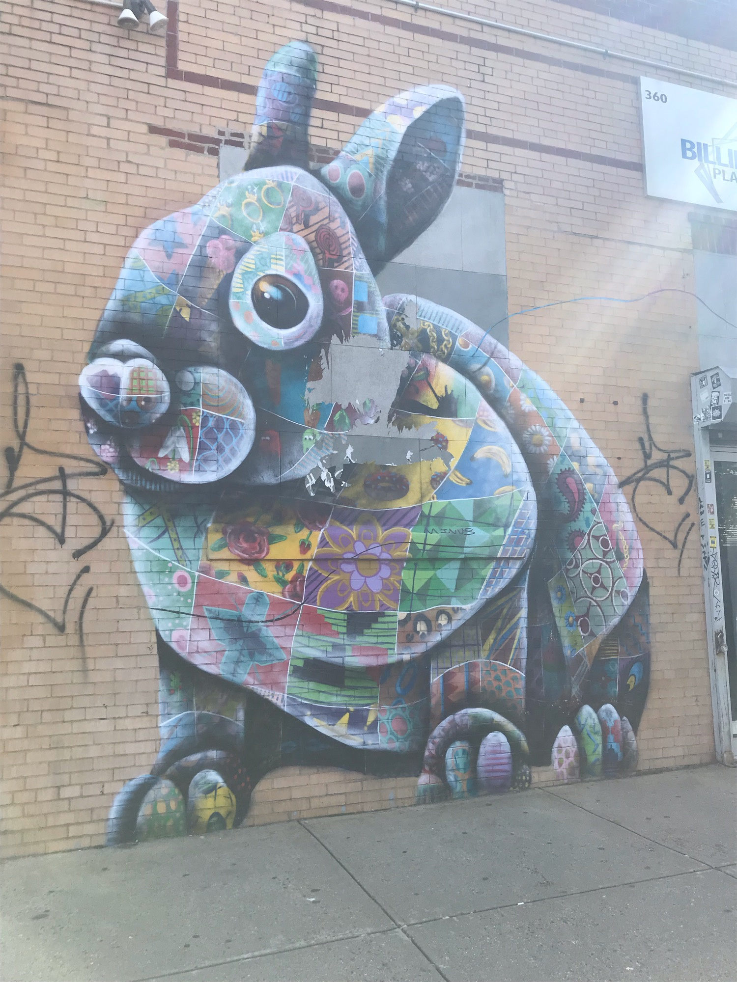 mural in Brooklyn by artist Louis Masai.