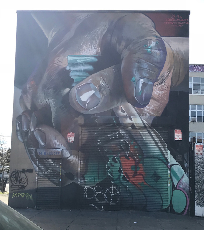 mural in Brooklyn by artist Case Maclaim.