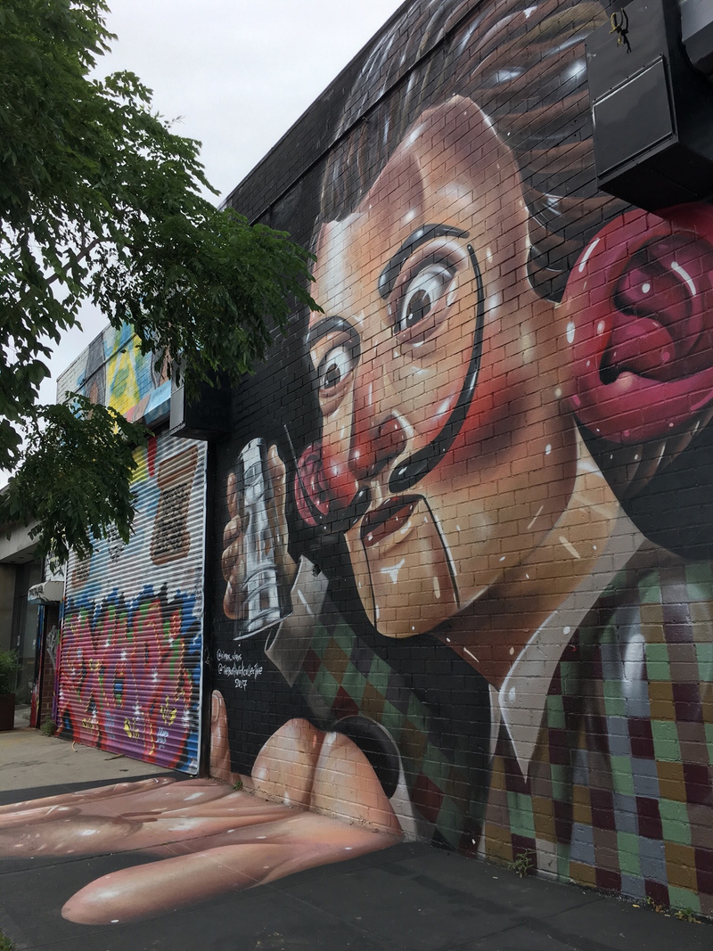 mural in Brooklyn by artist Sipros Naberezny.