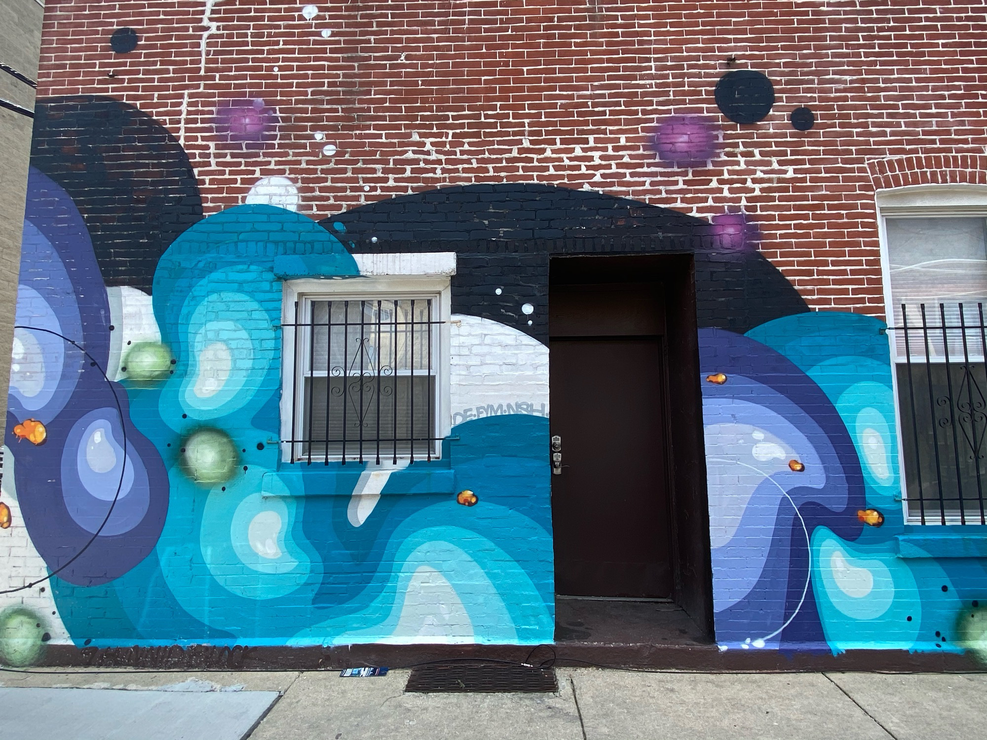 mural in Chicago by artist unknown.