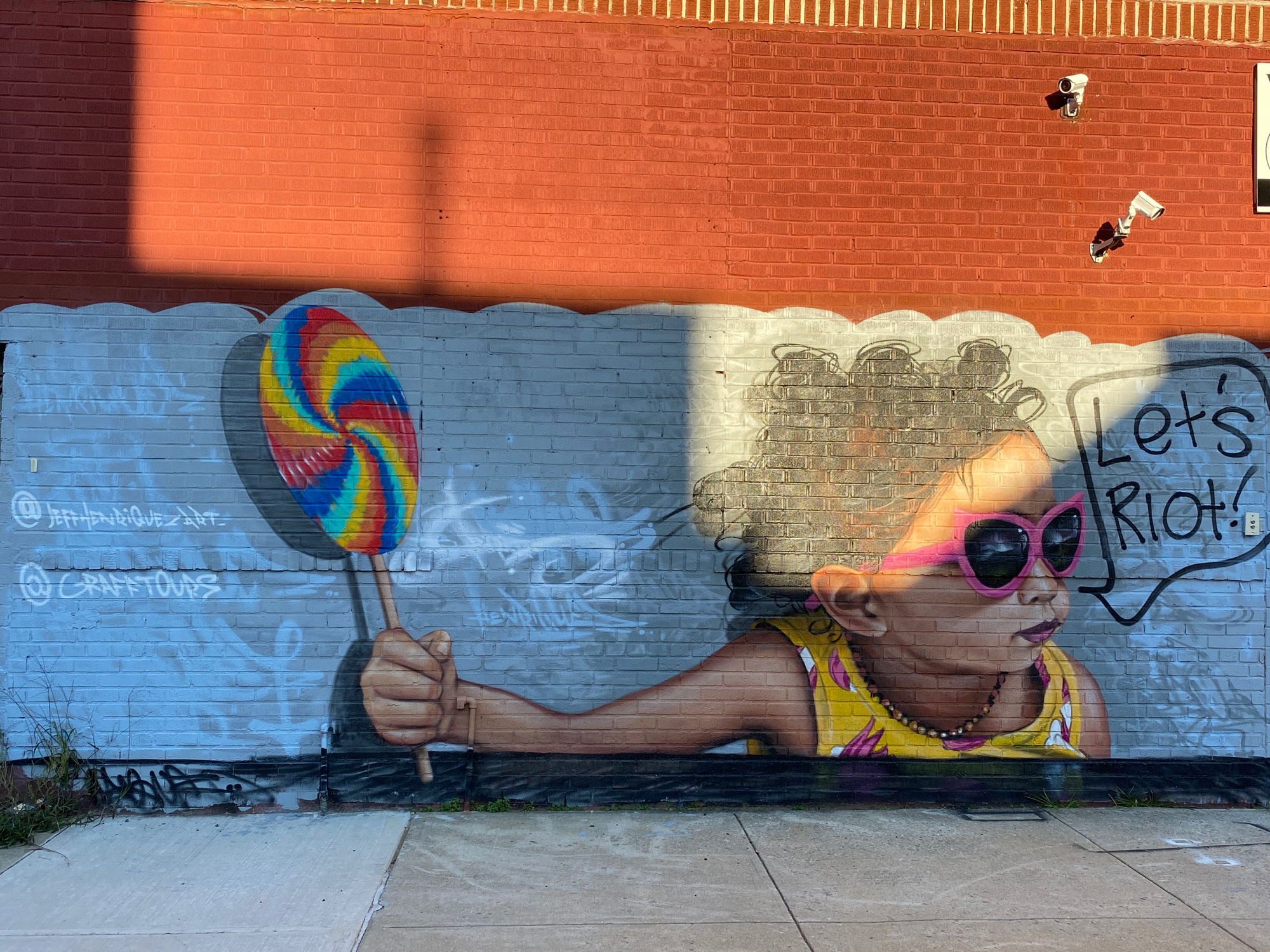mural in Brooklyn by artist Jeff Henriquez.