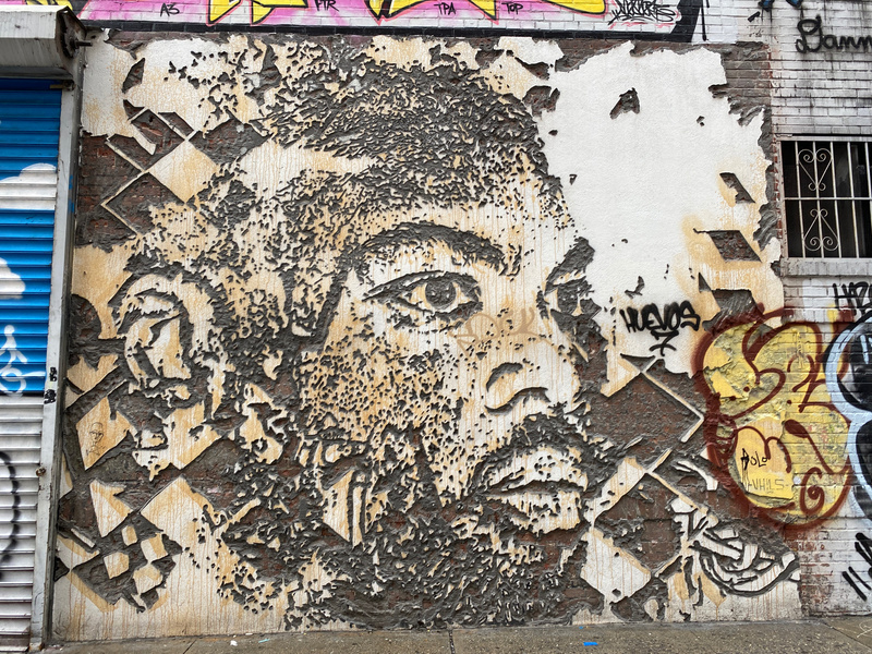 mural in New York by artist Vhils.
