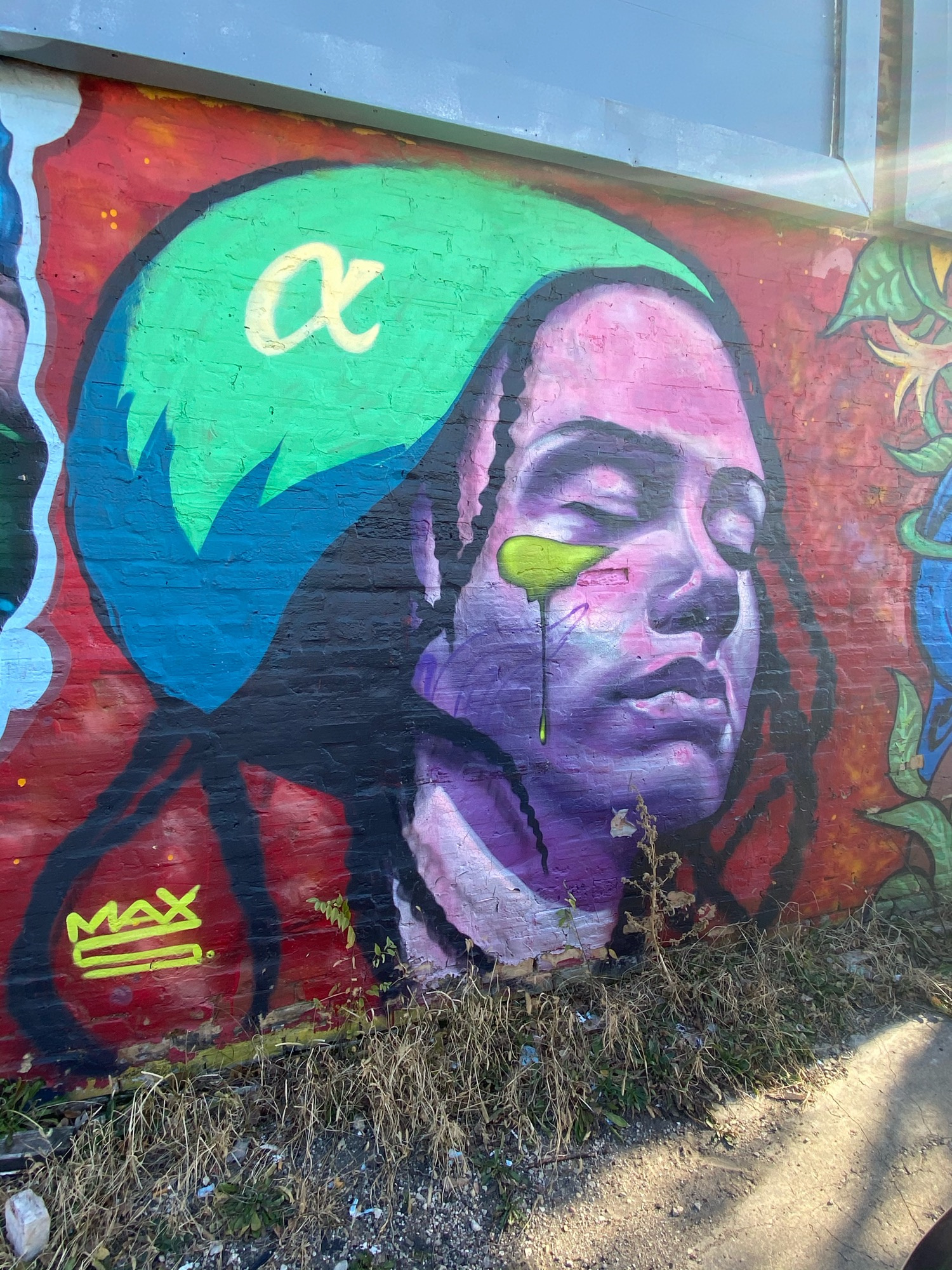 mural in Chicago by artist Rahmaan Statik.