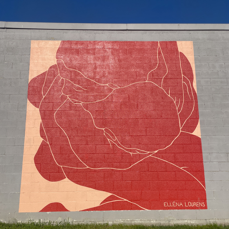 mural in Rochester by artist unknown.