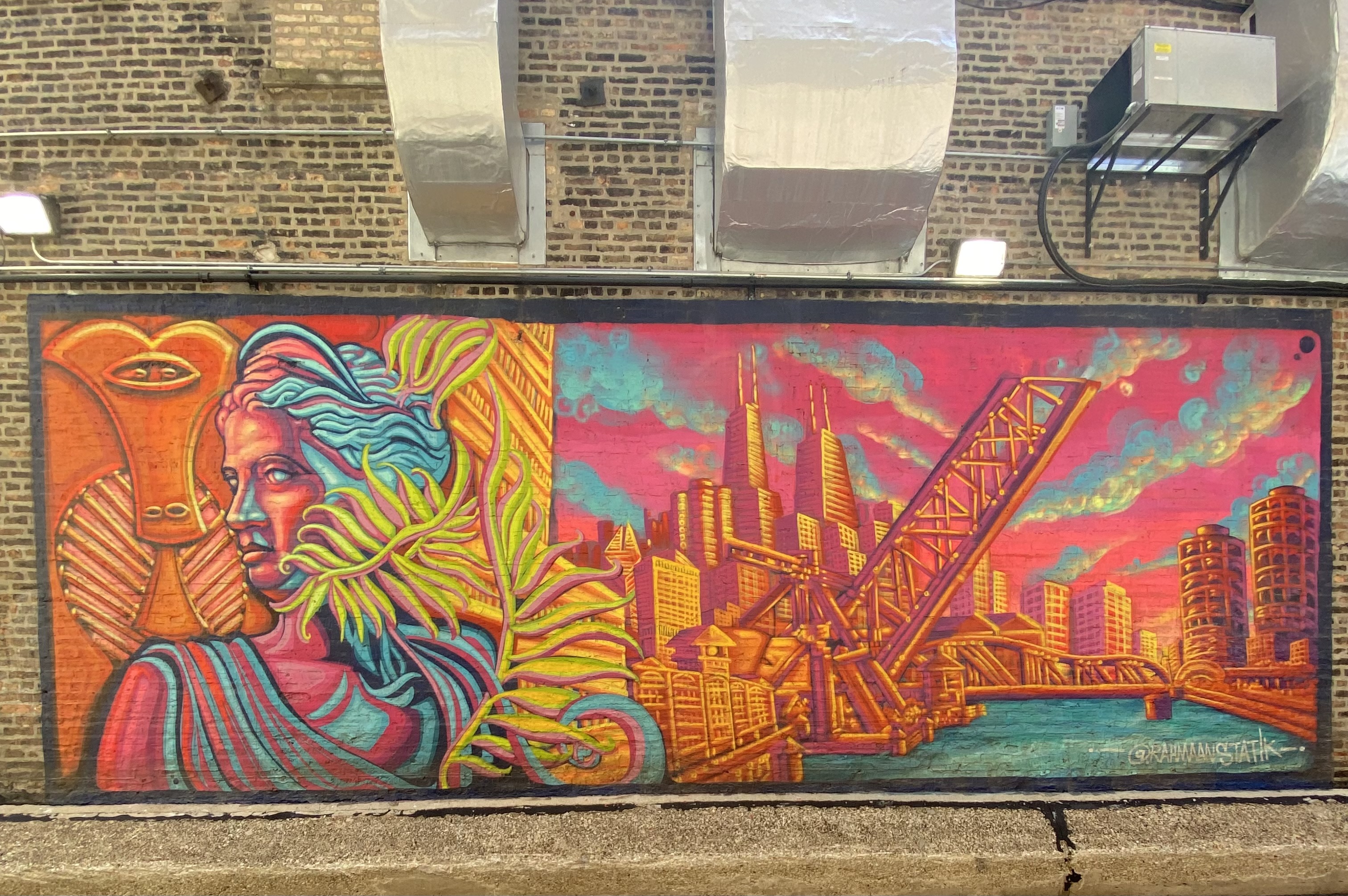mural in Chicago by artist Rahmaan Statik.