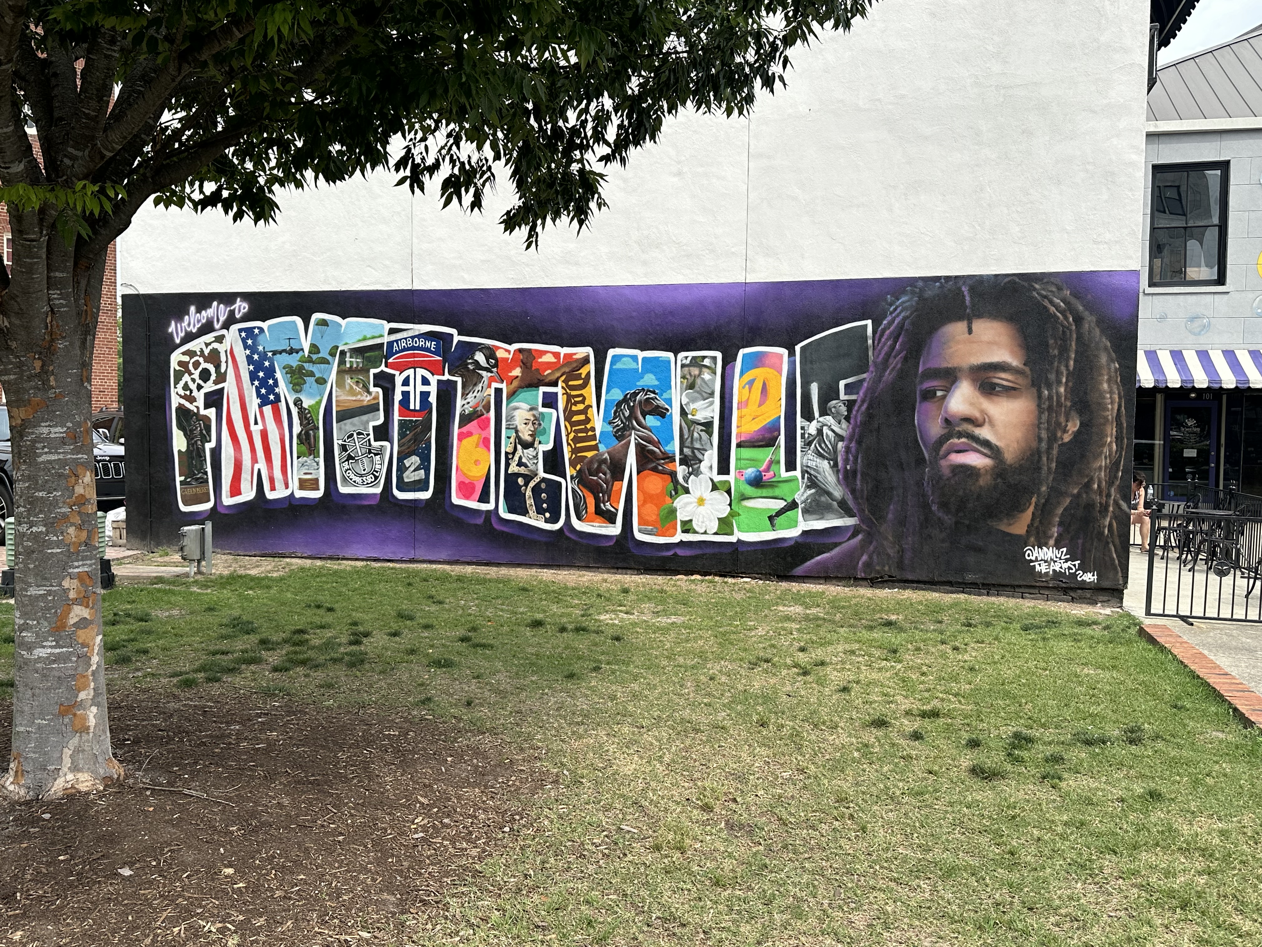 mural in Fayetteville by artist Andaluz. Tagged: J. Cole