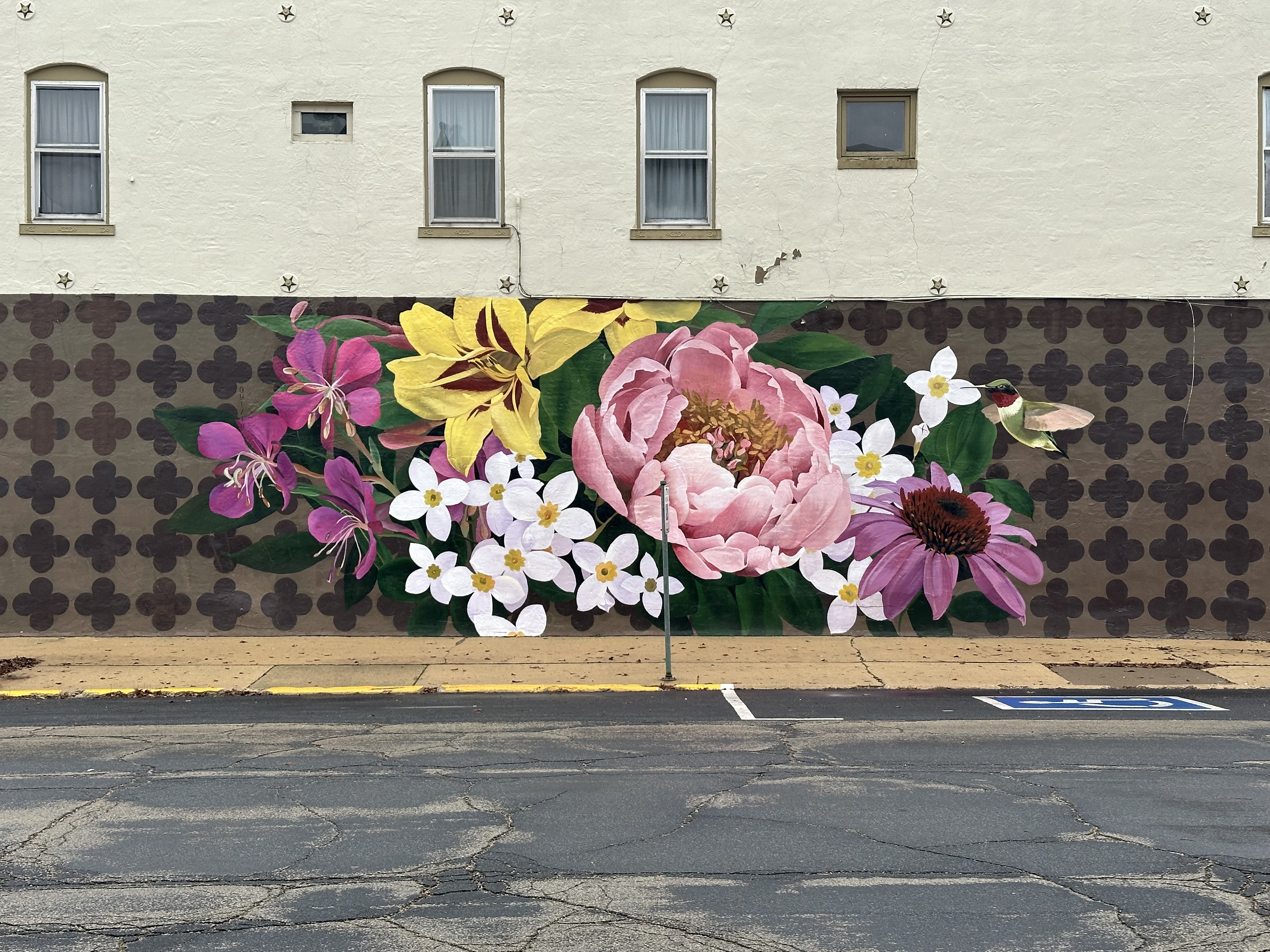 mural in Stockton by artist Ouizi.