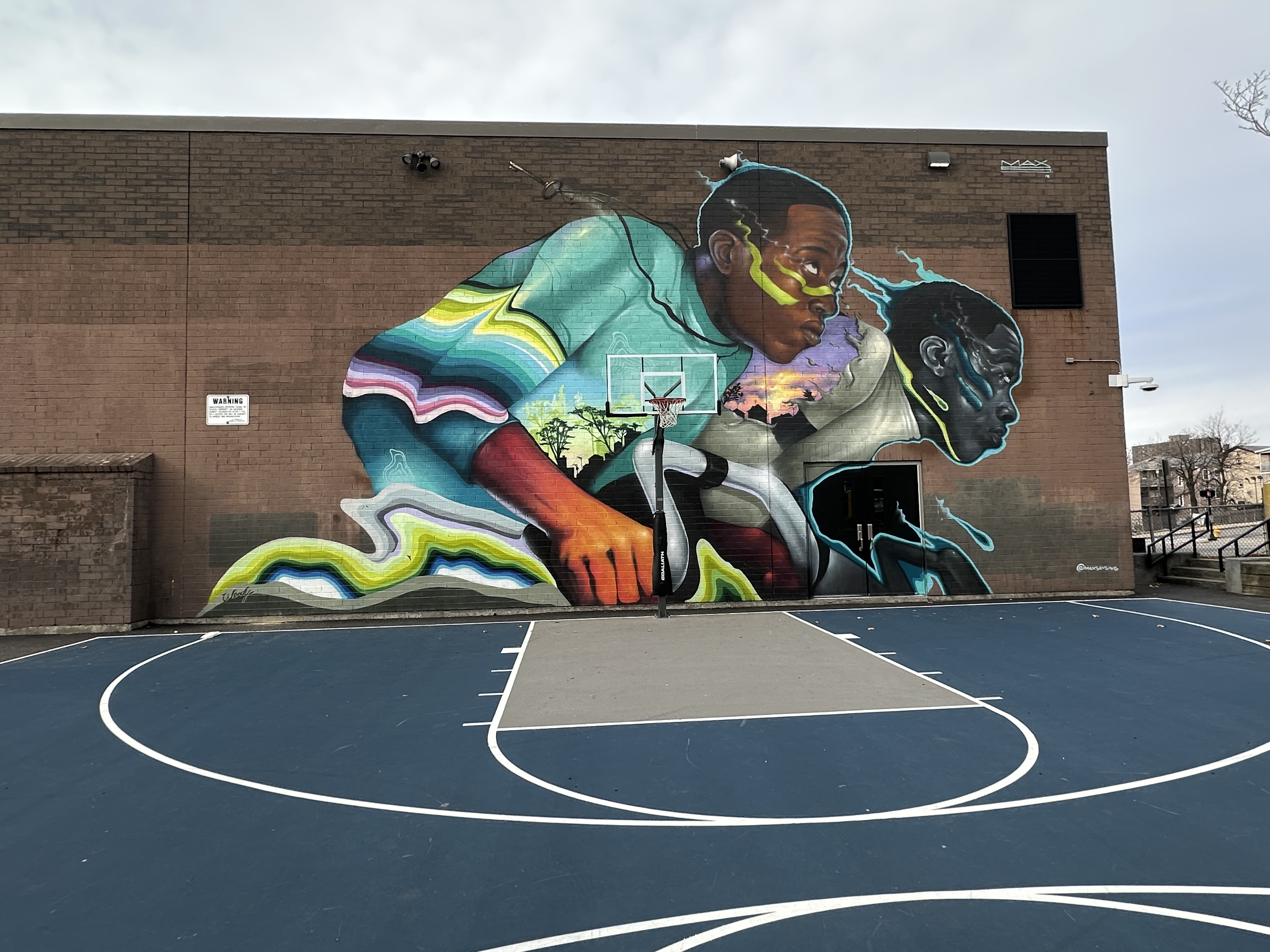 mural in Worcester by artist Max Sansing.