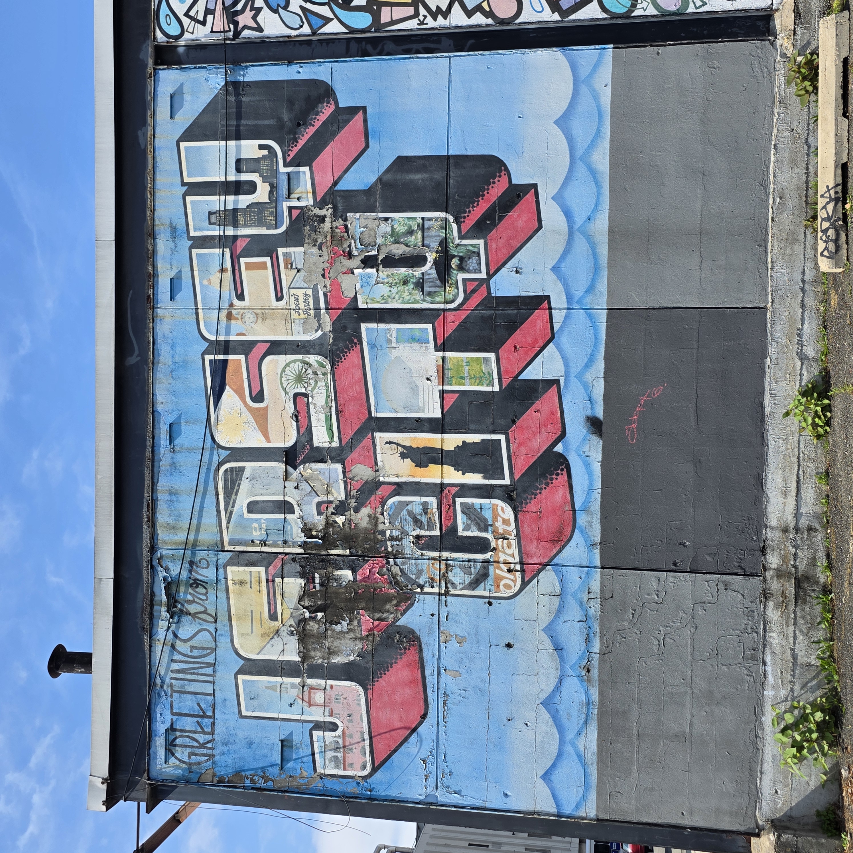 mural in Jersey City by artist Greetings Tour.