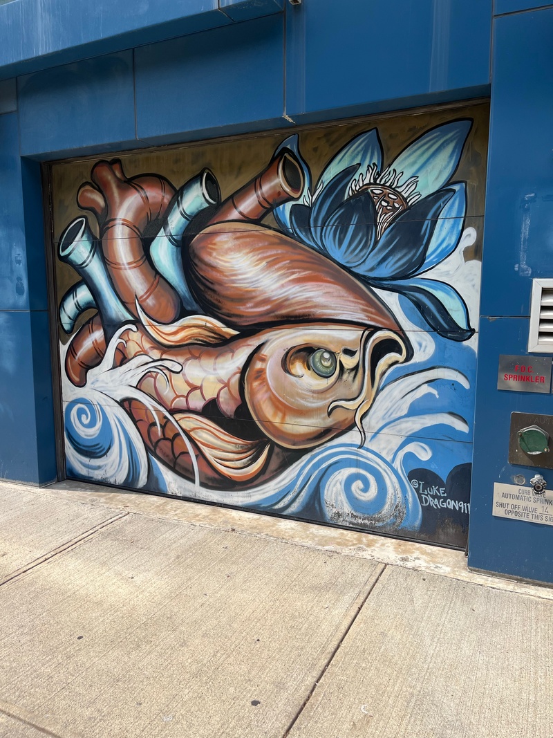 mural in Brooklyn by artist Luke Dragon 911.