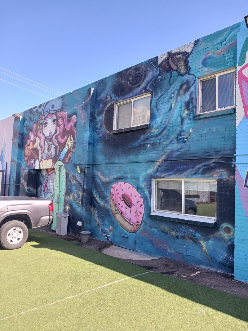 mural in Denver by artist UcSepia Ozjuah.