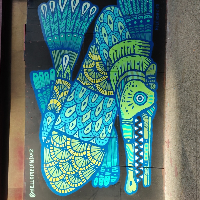 mural in Seattle by artist ViΜctor MeleΜndez.