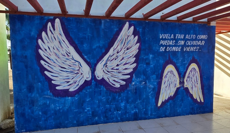 mural in Puerto San Carlos by artist unknown.