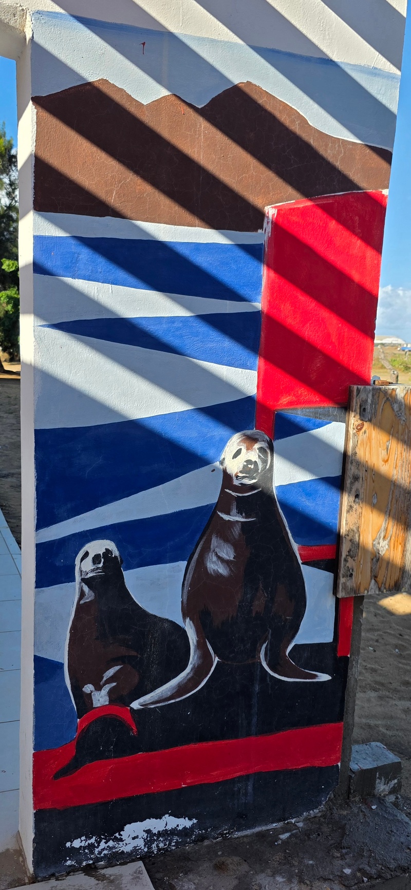 mural in Puerto San Carlos by artist unknown.